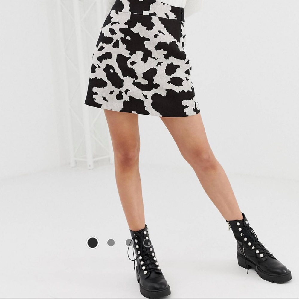 Stradivarius A-Line skirt in cow print size 10